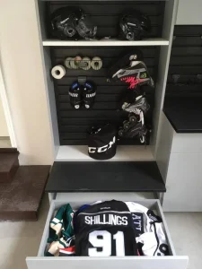 hockey+gear+in+cabinet+with+drawer